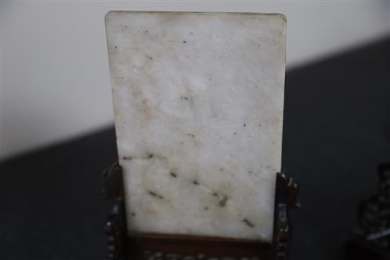 A pair of Chinese hardstone and coral table screens with hongmu stands, early 20th century, Total height 27cm